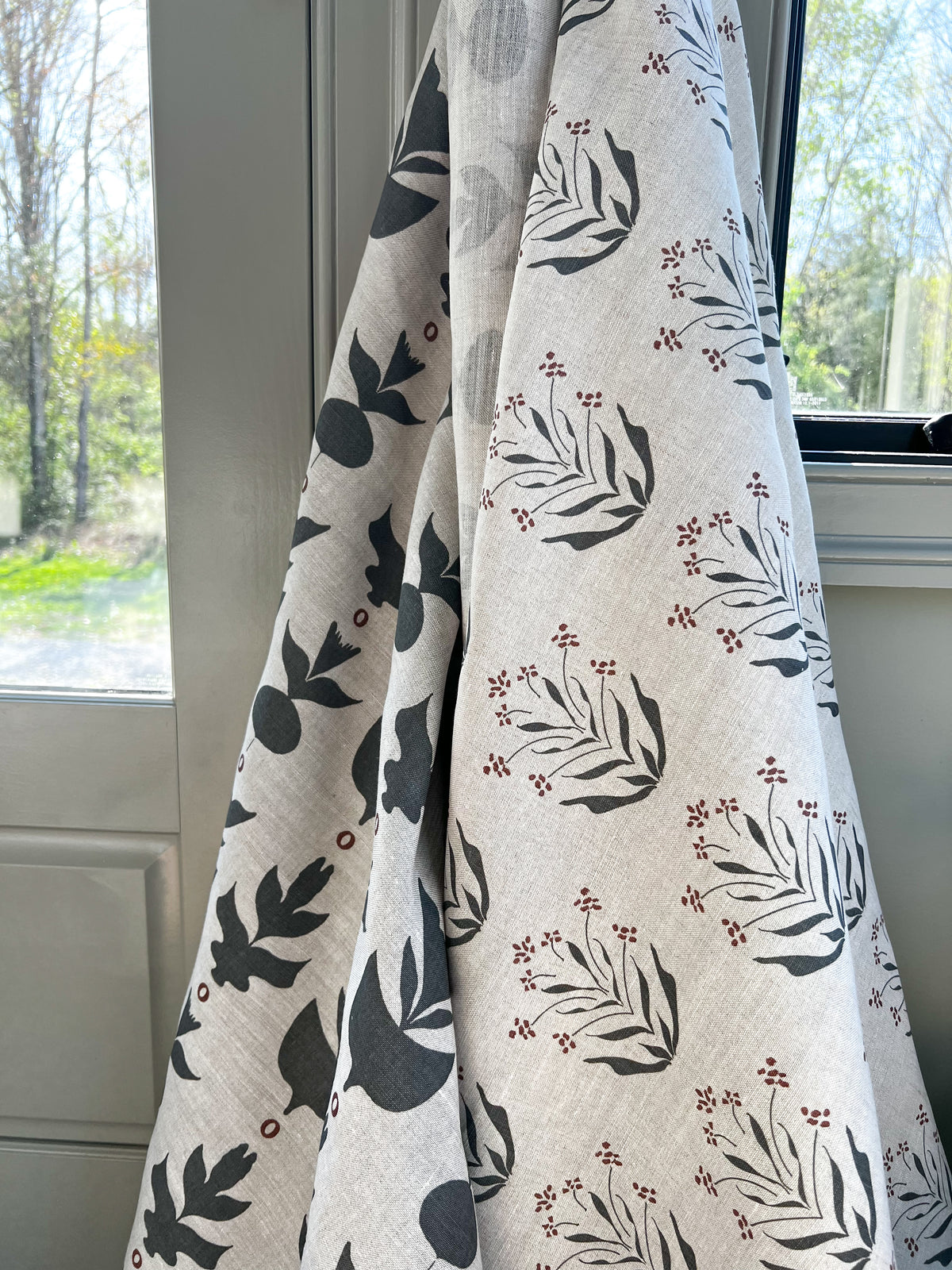 floral, botanical,  pattern greige textiles hand printed textiles to the interior Design trade Greige Textiles’ Paige fabric adds gentle botanical charm to accent chairs—hand-printed with the grace of early Zinnia blossoms