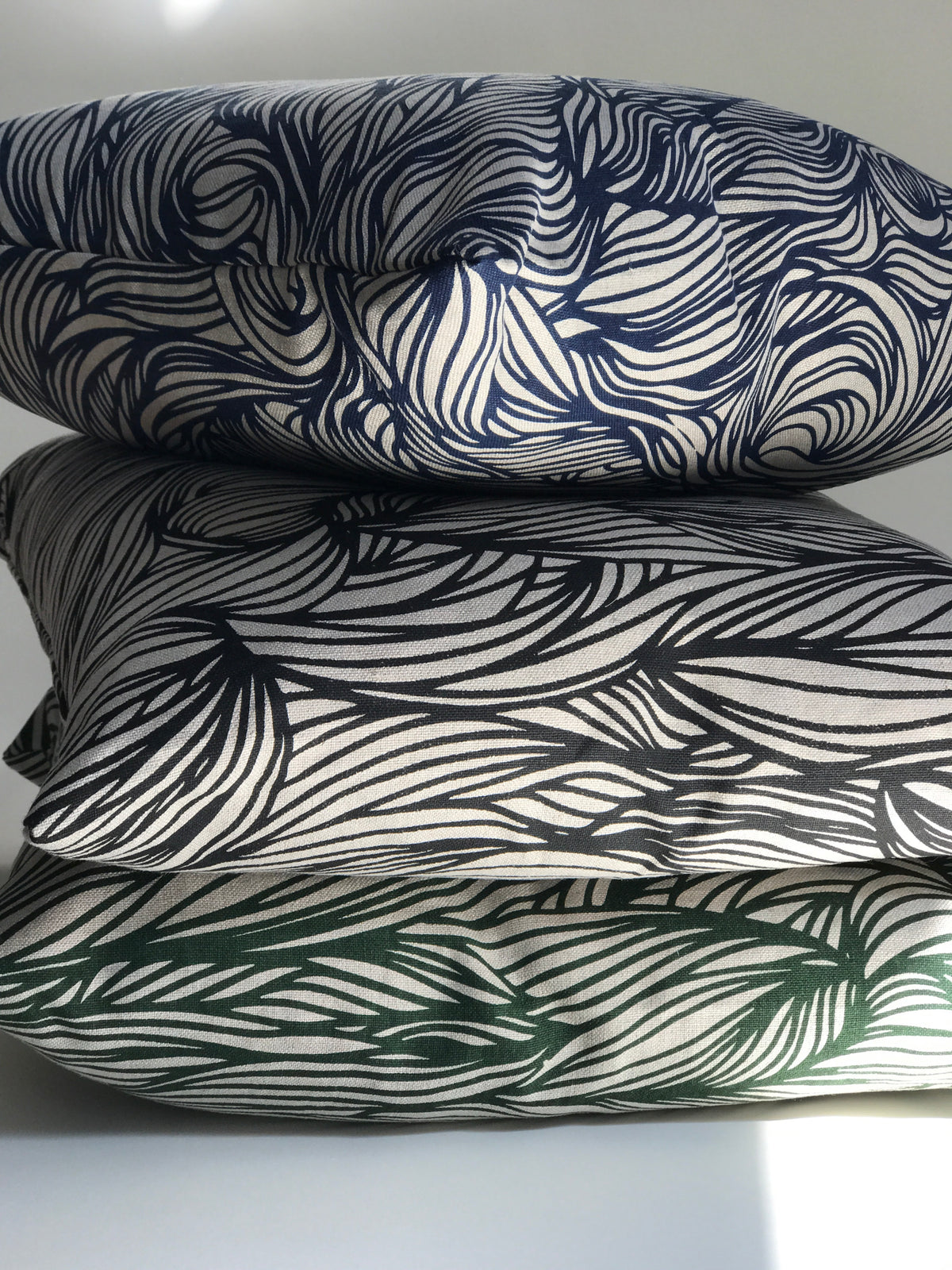 Trina Fabric Emerald on Natural greige textiles pillow hand made in california. From bold florals to abstract motifs, Greige Textiles offers playful, handcrafted patterns on linen—made for layered and inviting spaces.