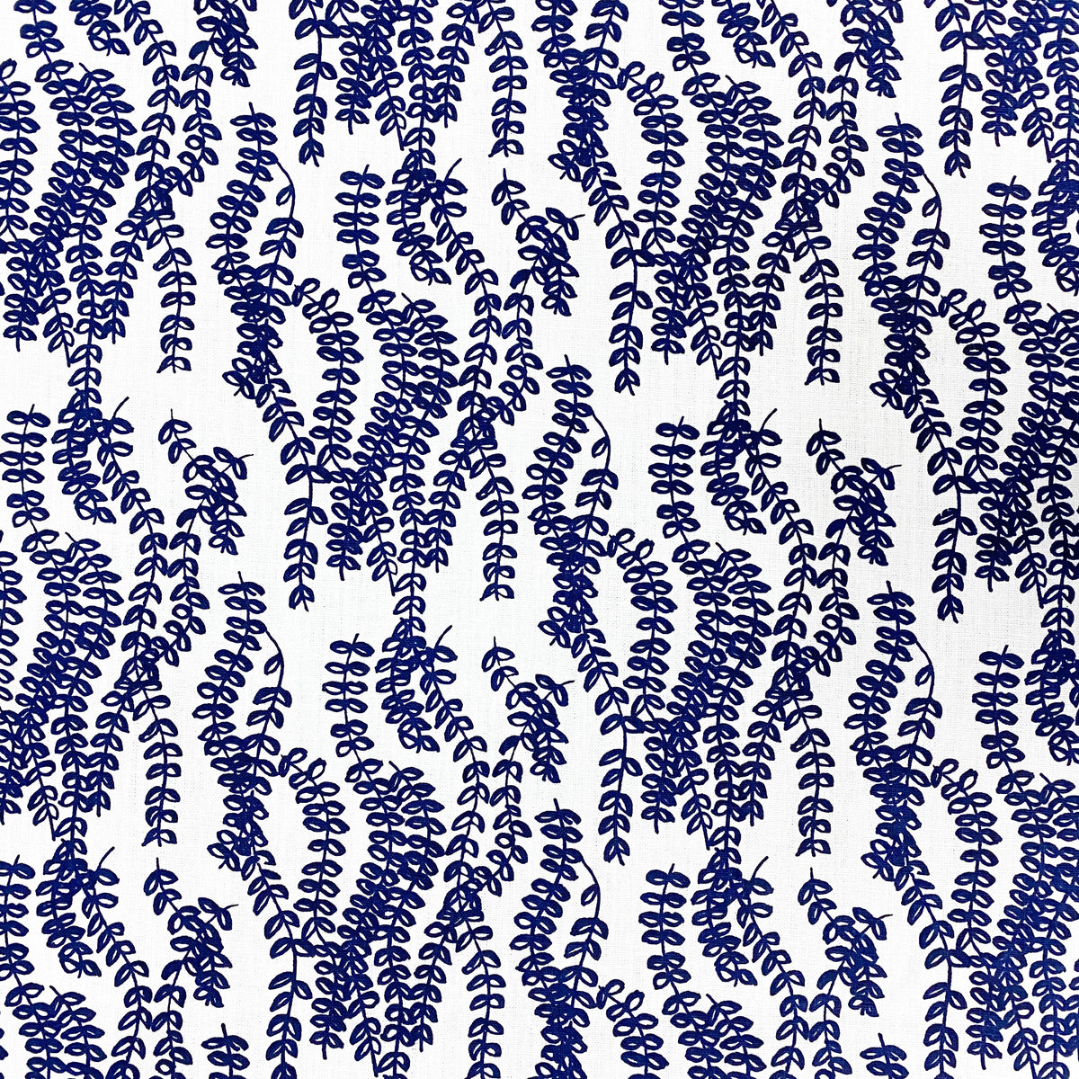 Trailing floral botanical design in Antoinette — hand-drawn and hand-printed on Belgian linen, reflecting natural abundance and thoughtful craftsmanship