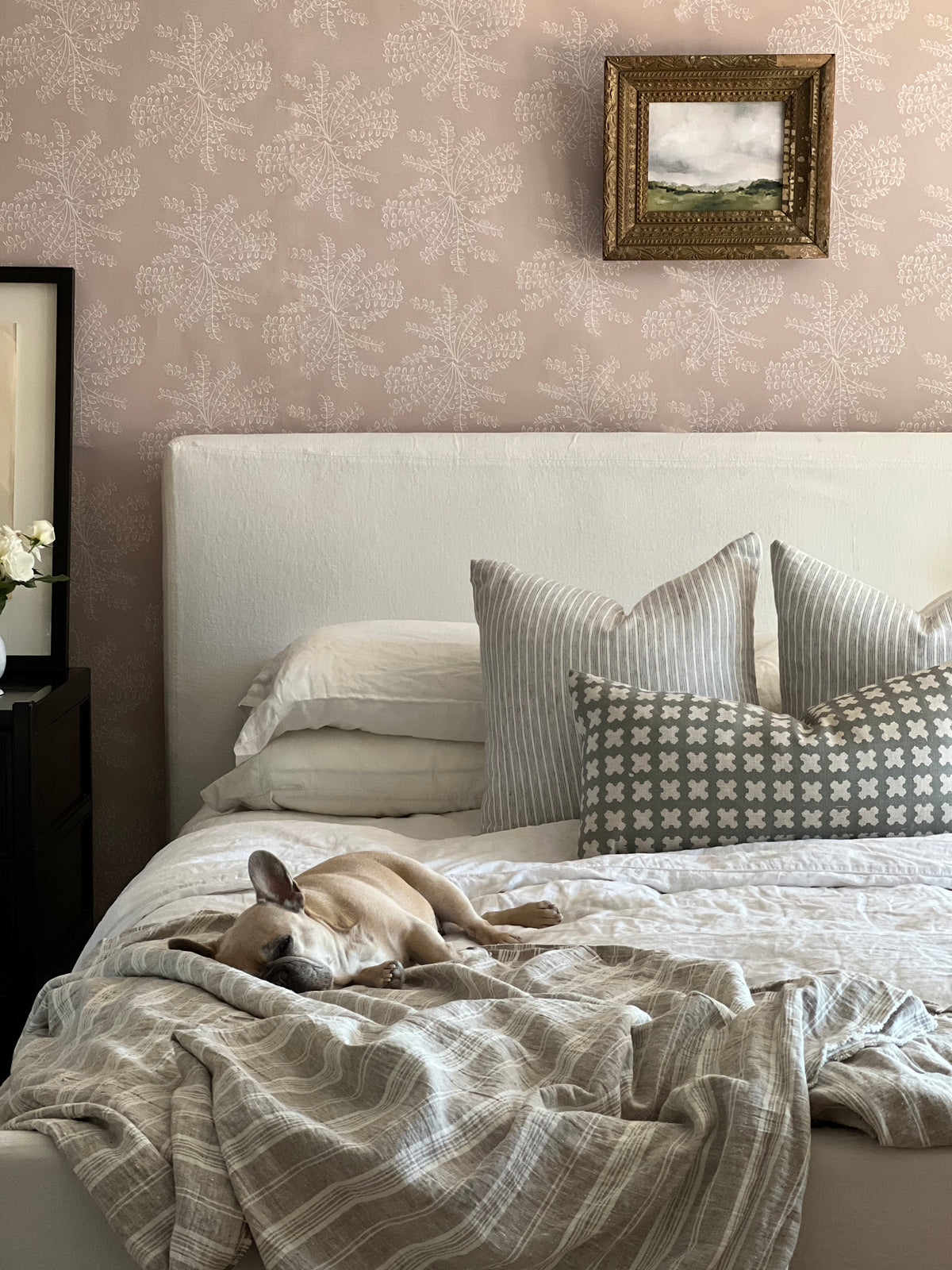 Ashby wallpaper — a botanical floral design reminiscent of untamed wildflower bouquets, available in soft, adaptable colorways.