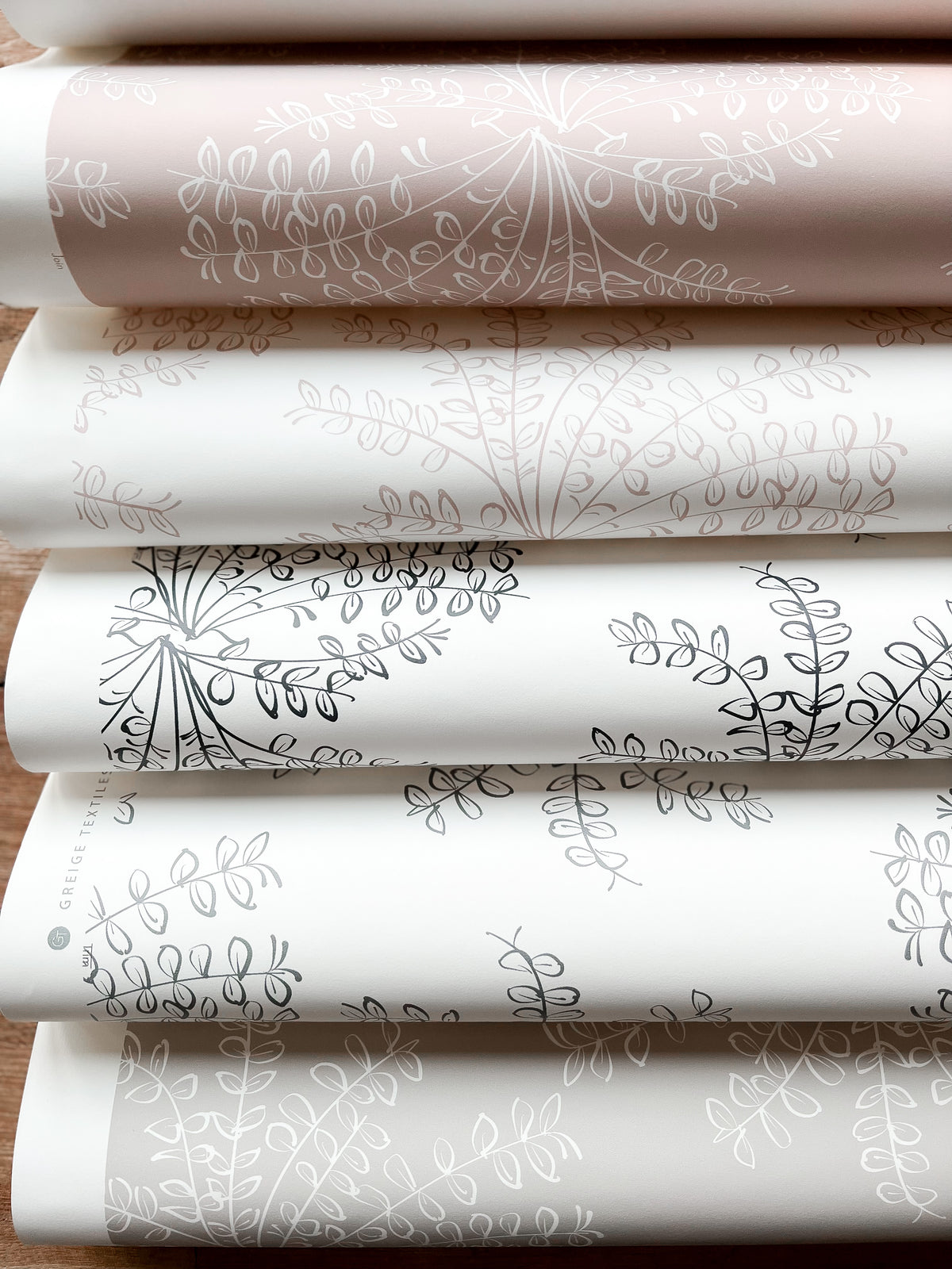 Ashby pattern — delicate wildflower-inspired wallpaper with organic linework, designed by Greige Textiles for a nature-infused interior statement.