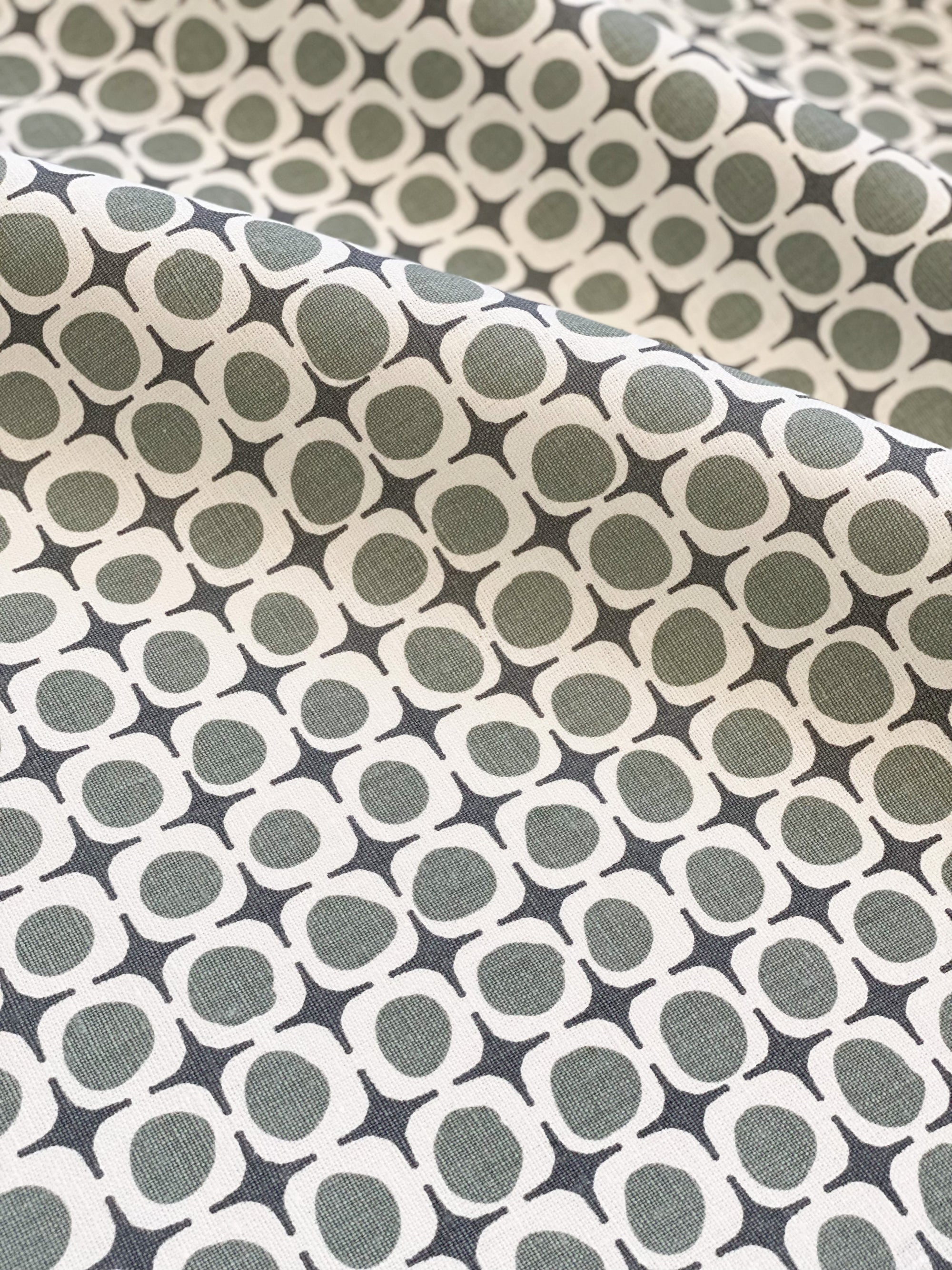 Avalon fabric — hand-printed geometric design with coastal inspiration, echoing architectural lines softened by nature.