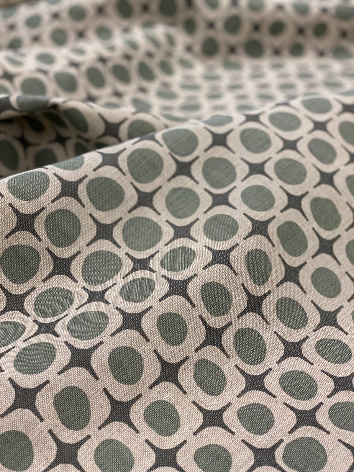 Avalon fabric — hand-printed geometric design with coastal inspiration, echoing architectural lines softened by nature.