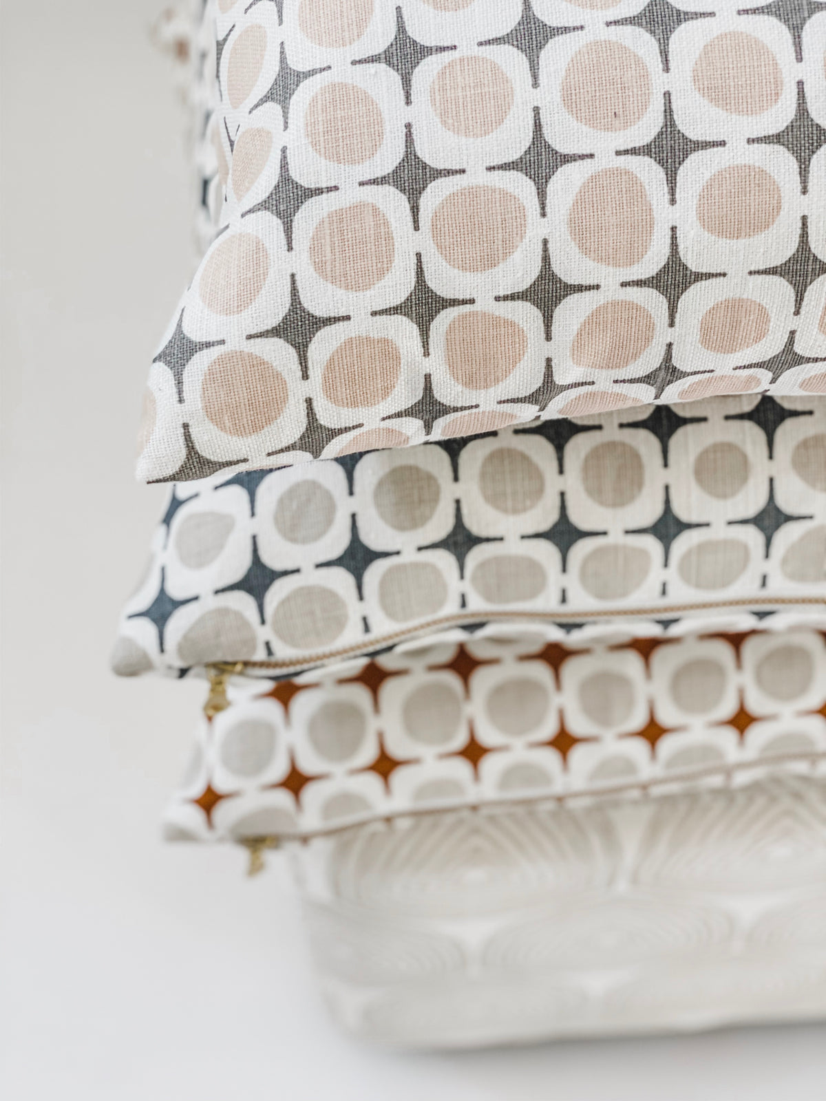 Avalon textile pattern by Greige Textiles — a geometric print inspired by the lines of Folly Beach Pier and the reflective light of high tide, screen printed on Belgian linen.