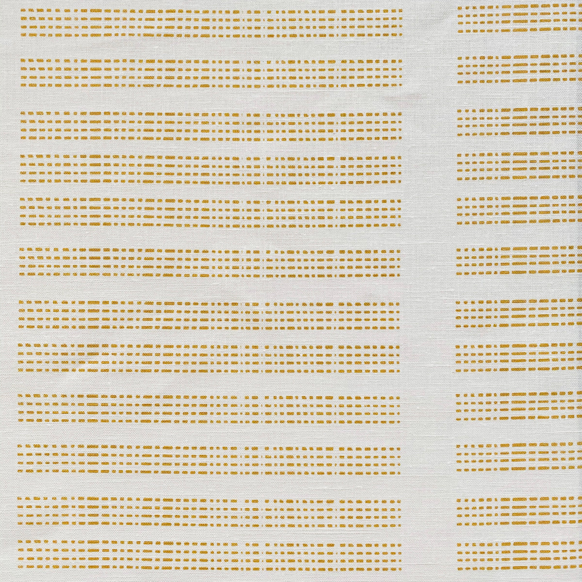 Barre fabric — artisan-made linear stripe design echoing the rhythmic shadows of architectural fencing in Baja California.