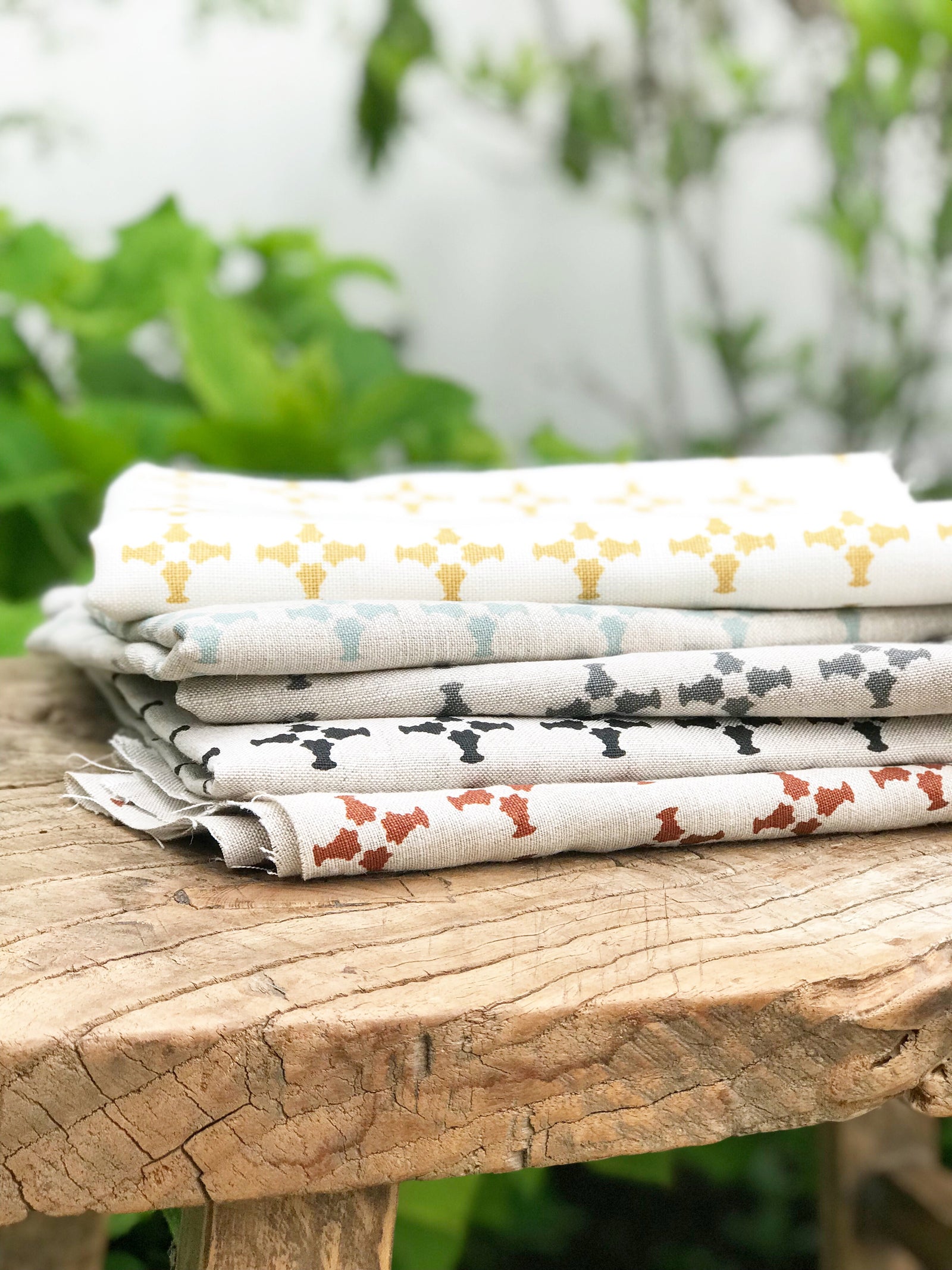 CanCan by Greige Textiles — a hand-printed open plaid design featuring subtle cross motifs, ideal for interior design applications like drapery, decorative pillows, and light upholstery.