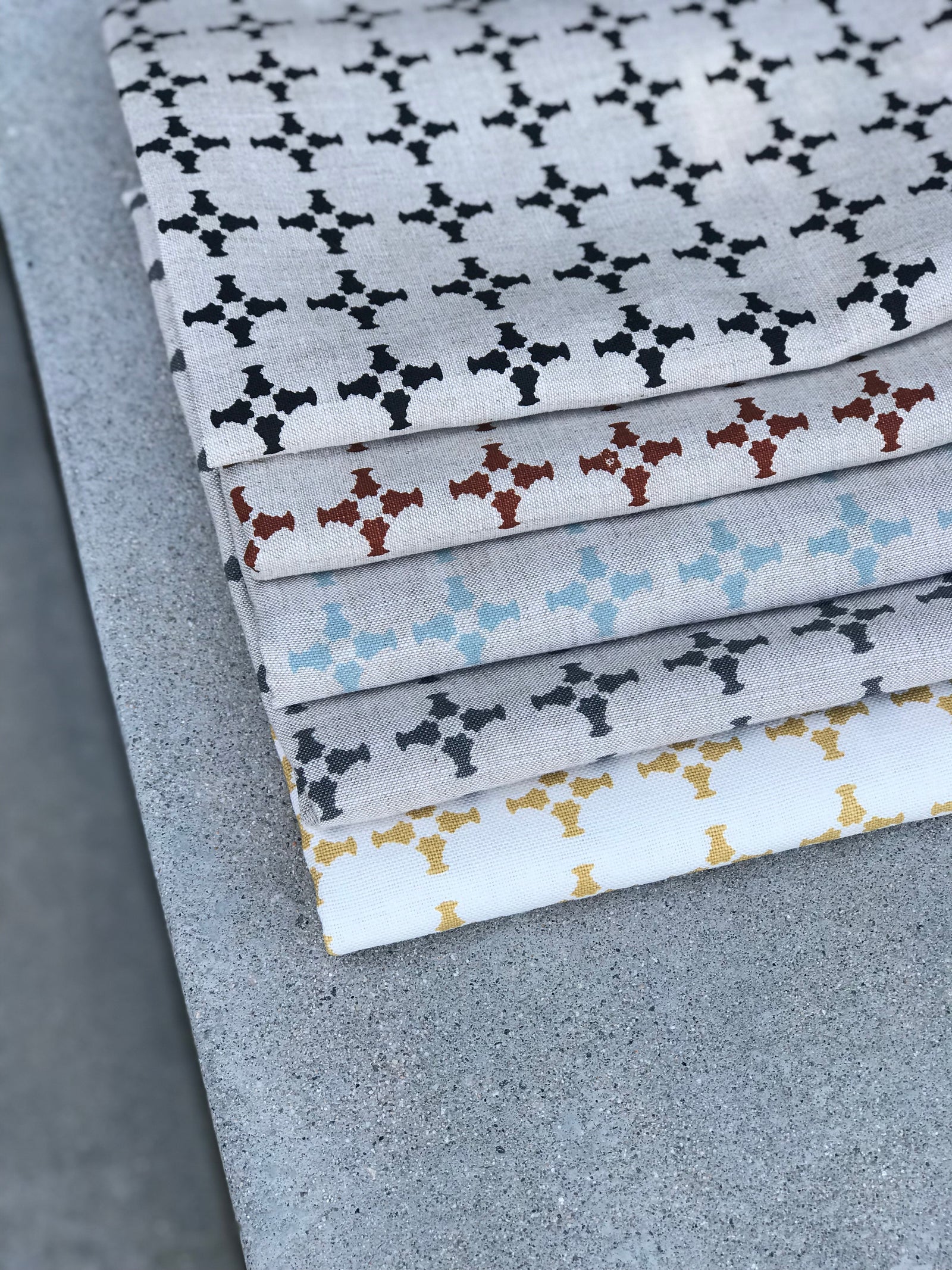 CanCan by Greige Textiles — a hand-printed open plaid design featuring subtle cross motifs, ideal for interior design applications like drapery, decorative pillows, and light upholstery.