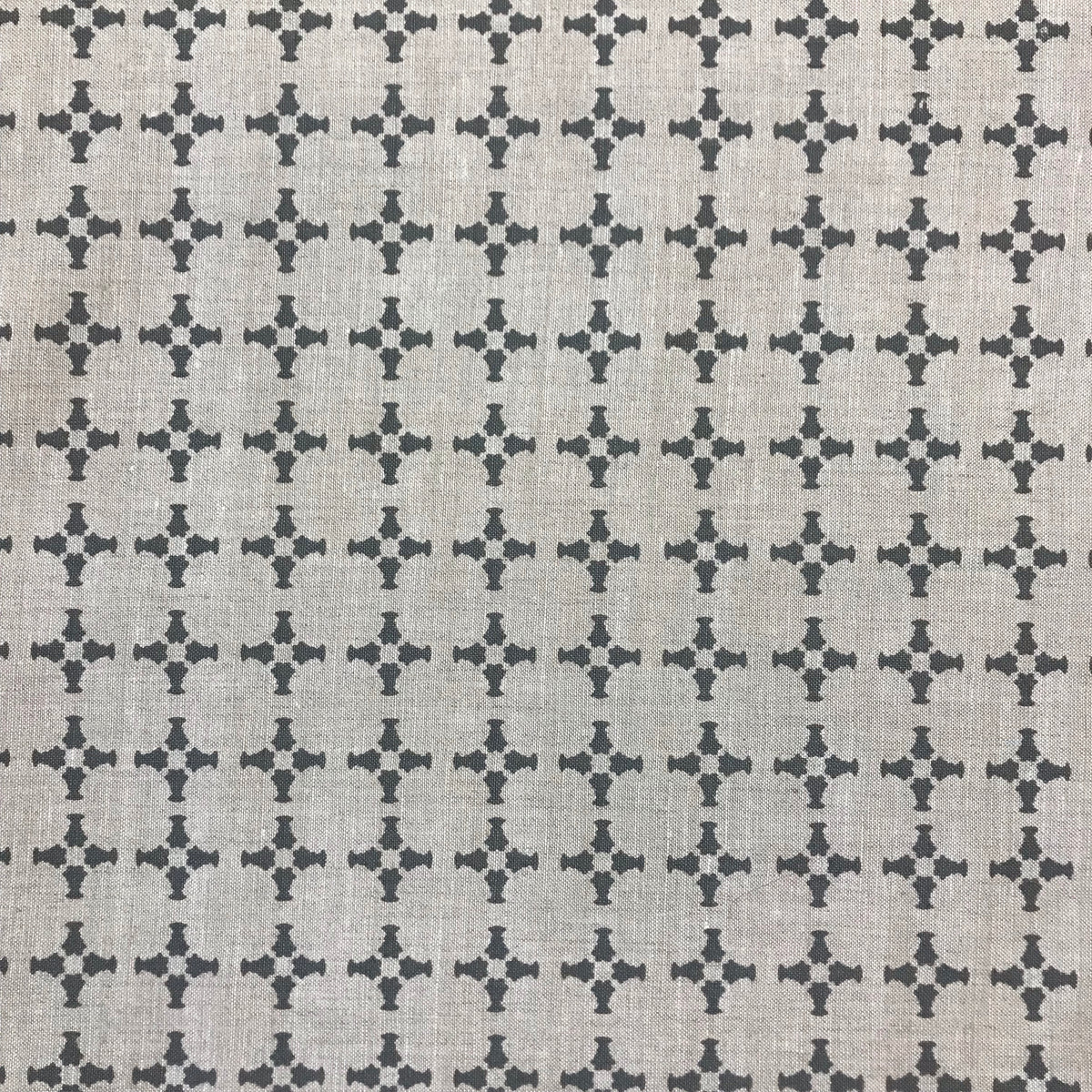 CanCan fabric — inspired by the geometry of brick edging, this open plaid pattern is hand-printed and ideal for bringing structure and subtle pattern to interior design schemes.