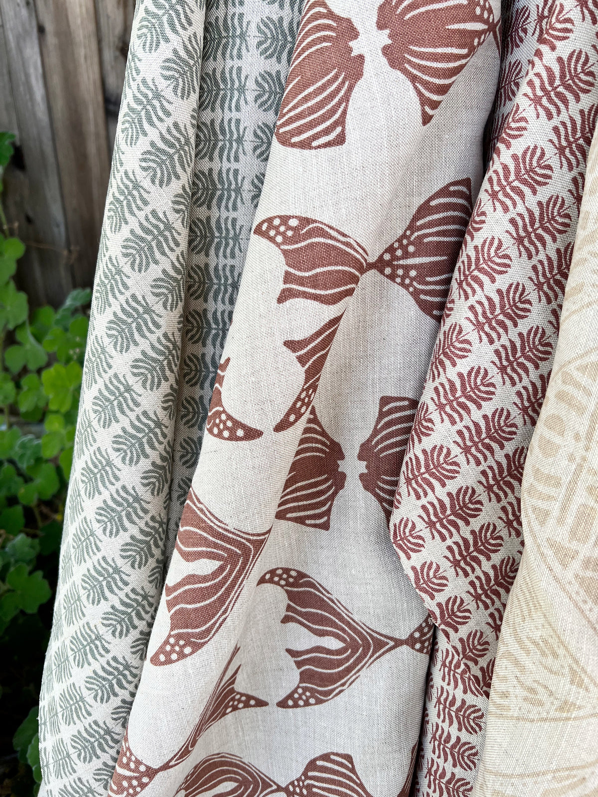 Greige Textiles Clara fabric — a light, botanical floral motif with heritage influences, hand-printed on Belgian linen for timeless interiors