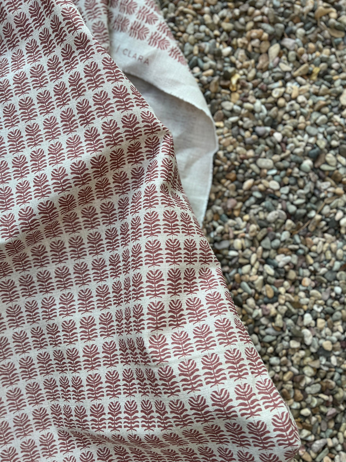 Clara pattern – A small-scale botanical print inspired by playful island ferns, hand-printed on Belgian linen for drapery, upholstery, and decorative pillows by greige textiles