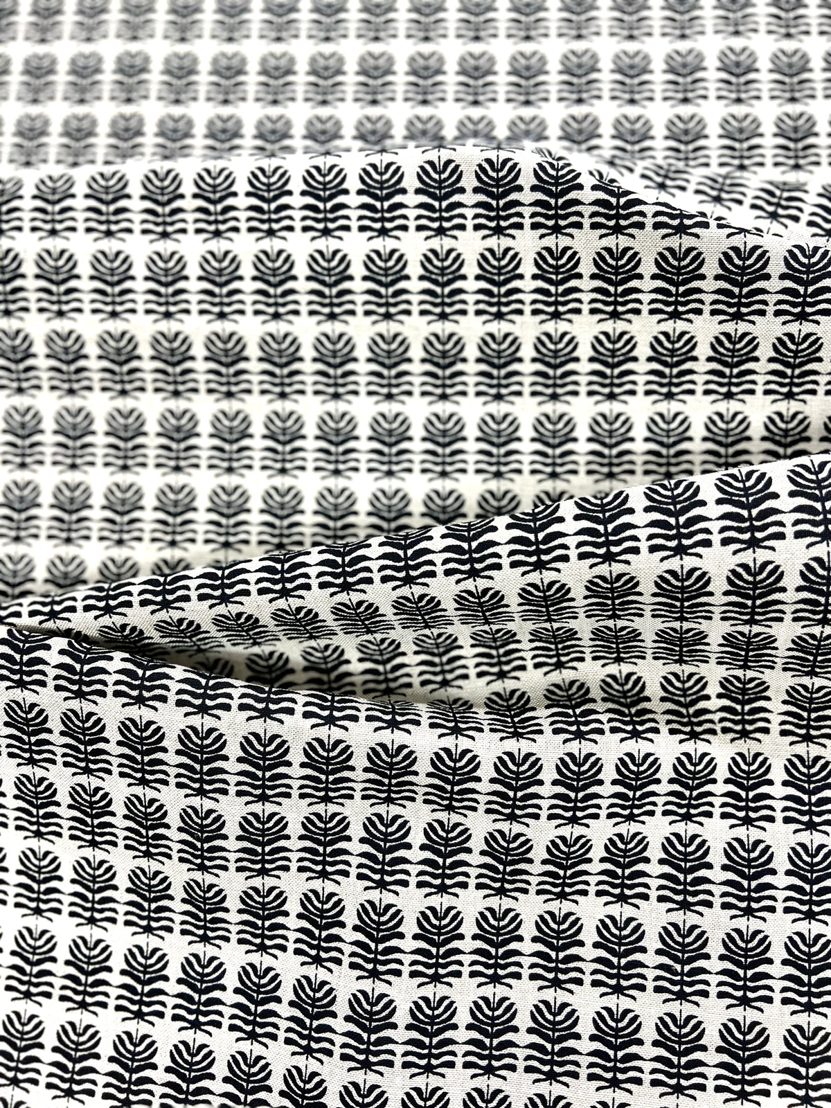 Clara fabric – A delicate fern-like pattern evoking Kauai&#39;s trails, hand-printed on linen, ideal for refined interior design projects by greige textile