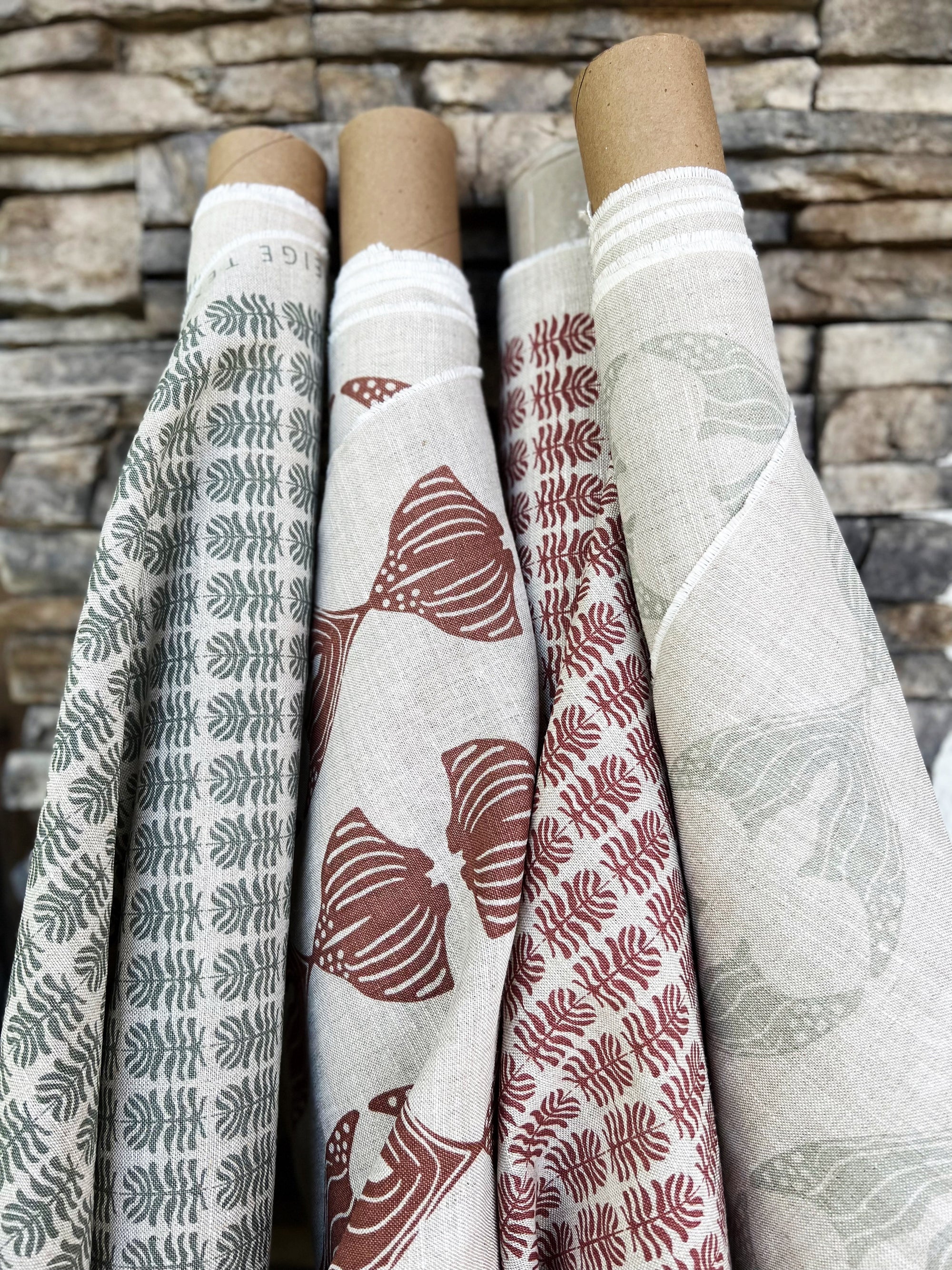 Greige Textiles Clara fabric — a light, botanical floral motif with heritage influences, hand-printed on Belgian linen for timeless interiors