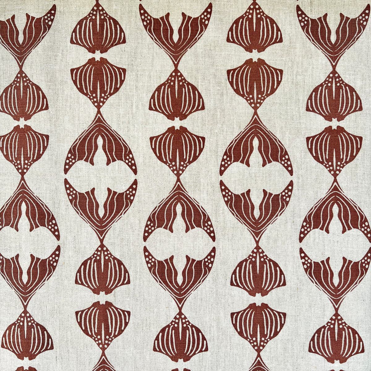 Daphne stripe fabric by Greige Textiles — a modern, organic pattern featuring abstract fishlike forms, hand-printed on Belgian linen for drapery, cushions, or upholstery.