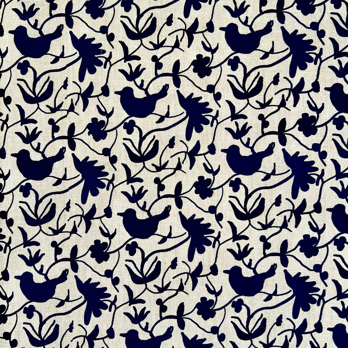 Greige Textiles’ Eliza pattern — an expressive floral and bird motif, screen printed on natural Belgian linen for timeless appeal. Blue on Linen.