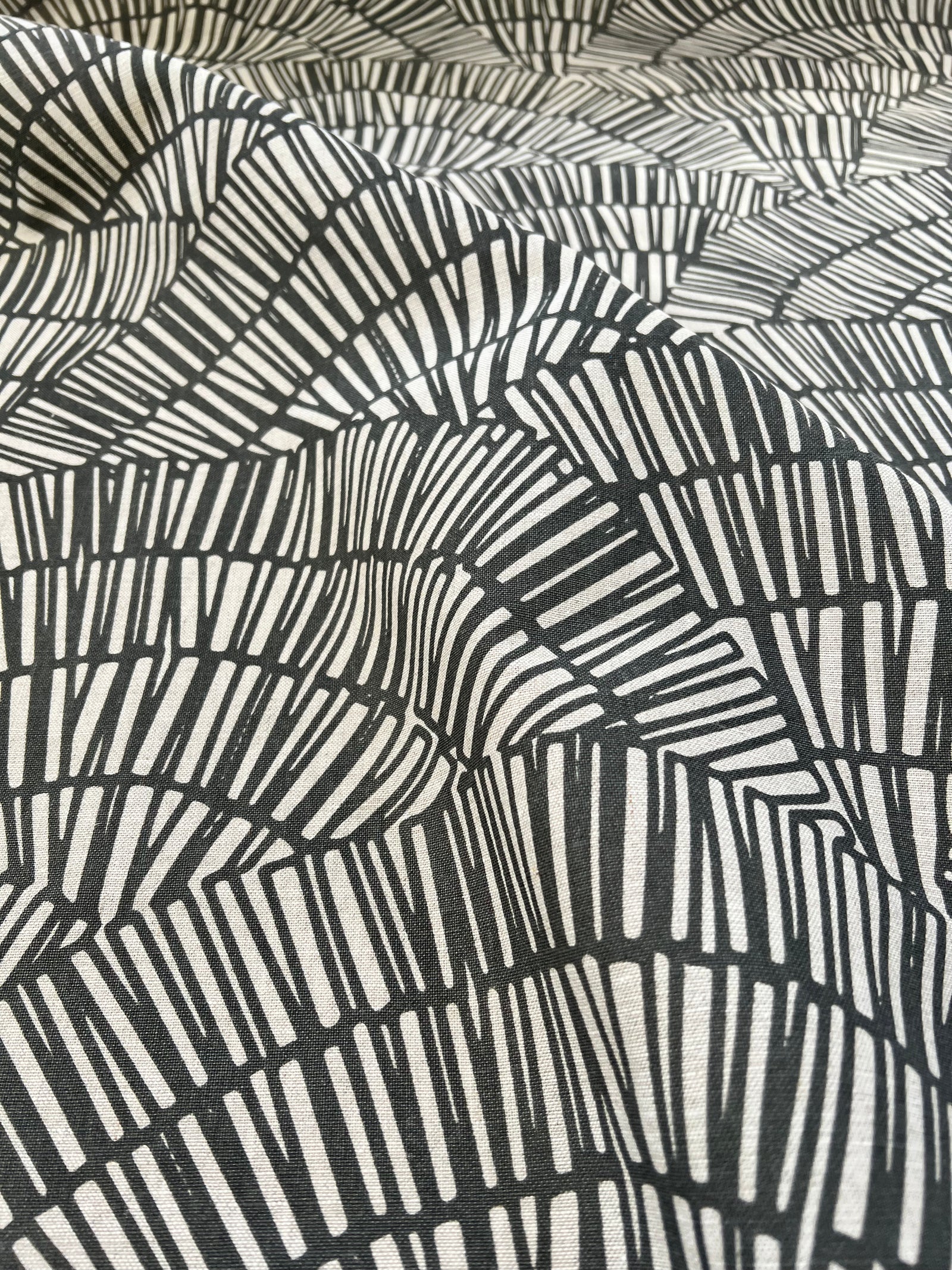 Bold, playful, and printed by hand—Greige Textiles’ linen designs bring your space to life. Visit us to explore.