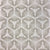 Cie by Greige Textiles channels bold movement and graphic drama in its radiant starburst shield pattern, hand printed on Belgian linen for statement-making design moments