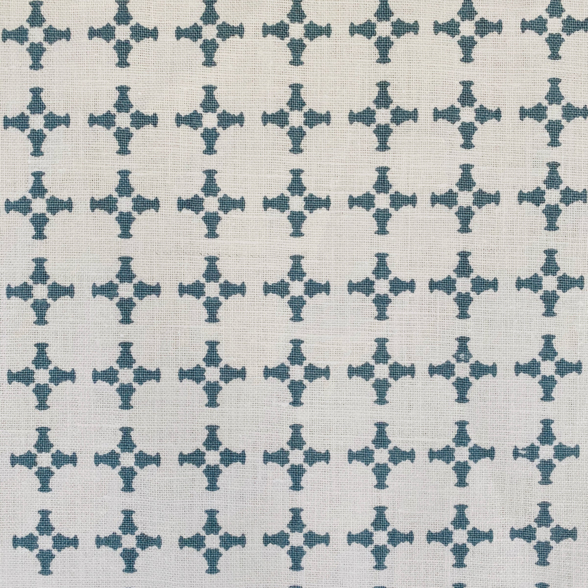 CanCan fabric — inspired by the geometry of brick edging, this open plaid pattern is hand-printed and ideal for bringing structure and subtle pattern to interior design schemes.