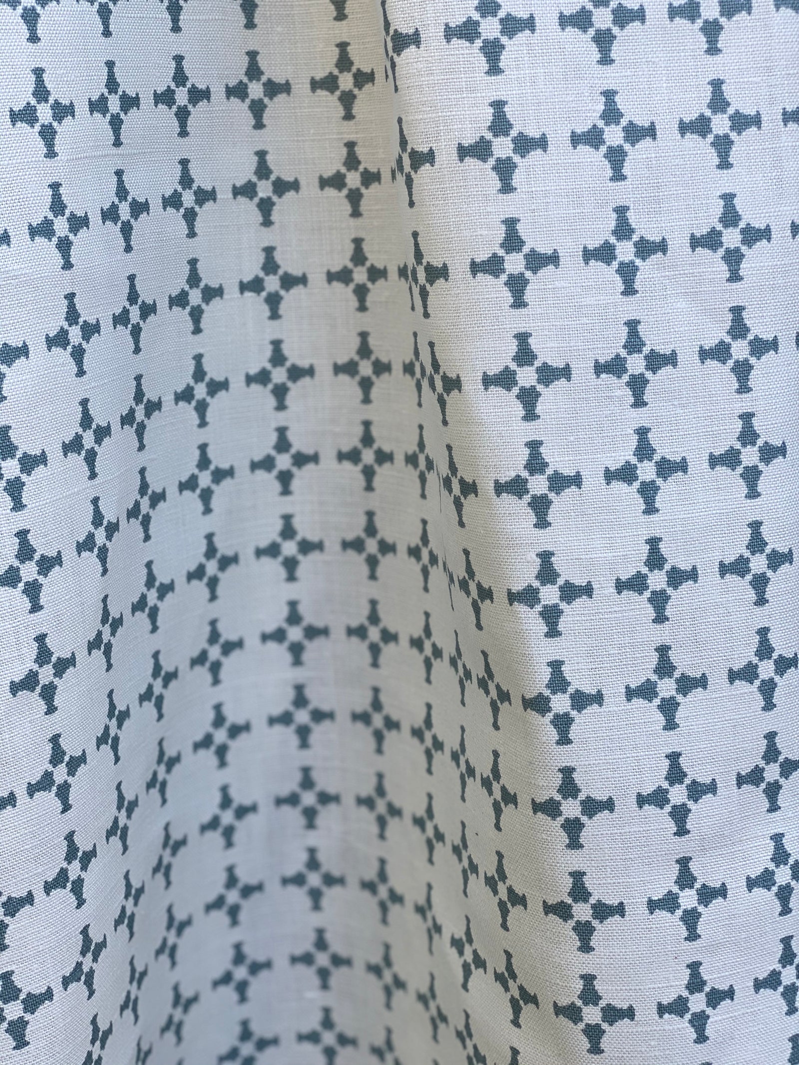 CanCan fabric — inspired by the geometry of brick edging, this open plaid pattern is hand-printed and ideal for bringing structure and subtle pattern to interior design schemes.