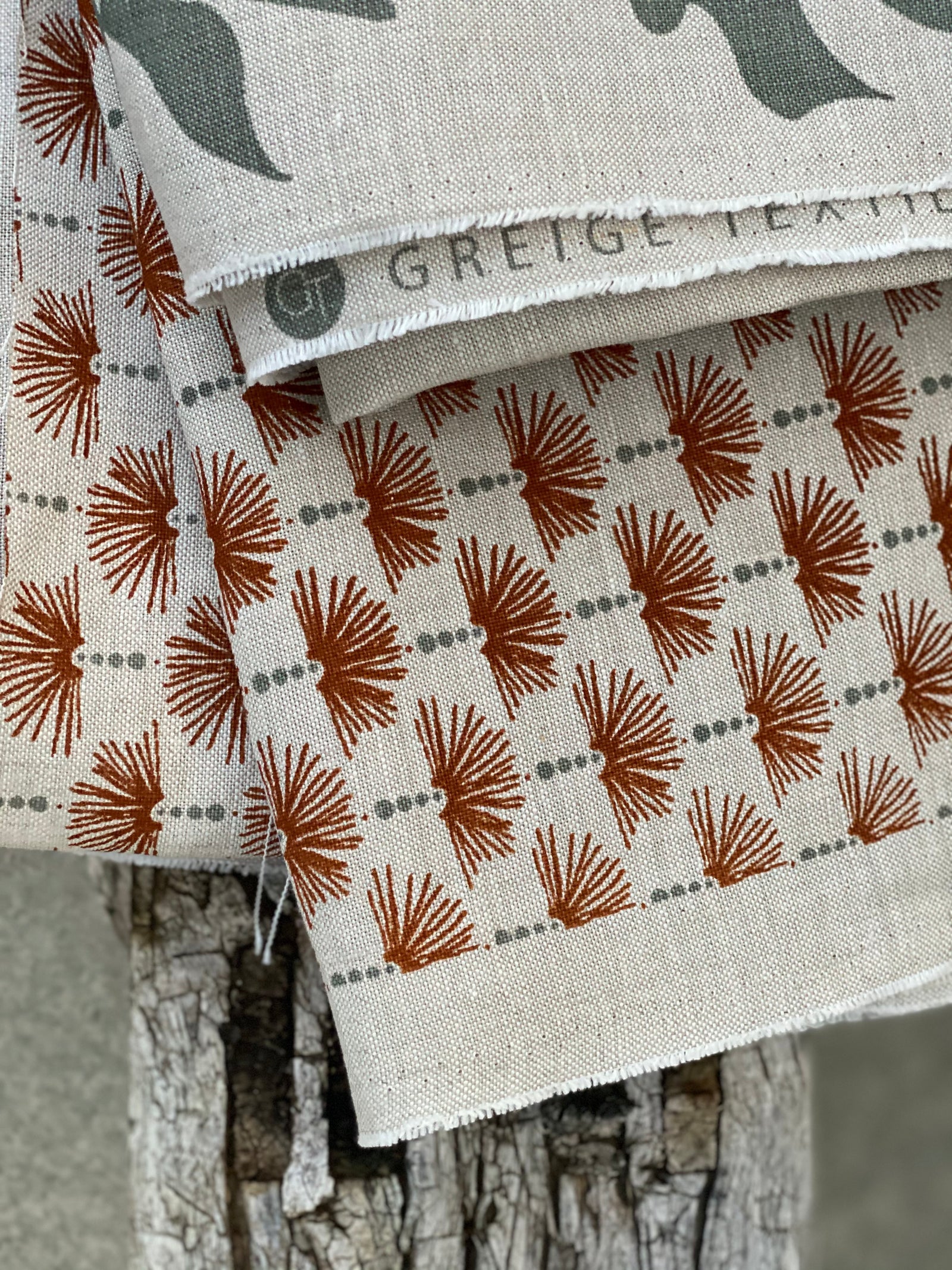 Nathalie is a soft, architectural motif inspired by the quiet elegance of Parisian doorways and arches. Like the worn embossments that grace the city’s façades, this pattern carries a sense of history—refined, welcoming, and quietly storied