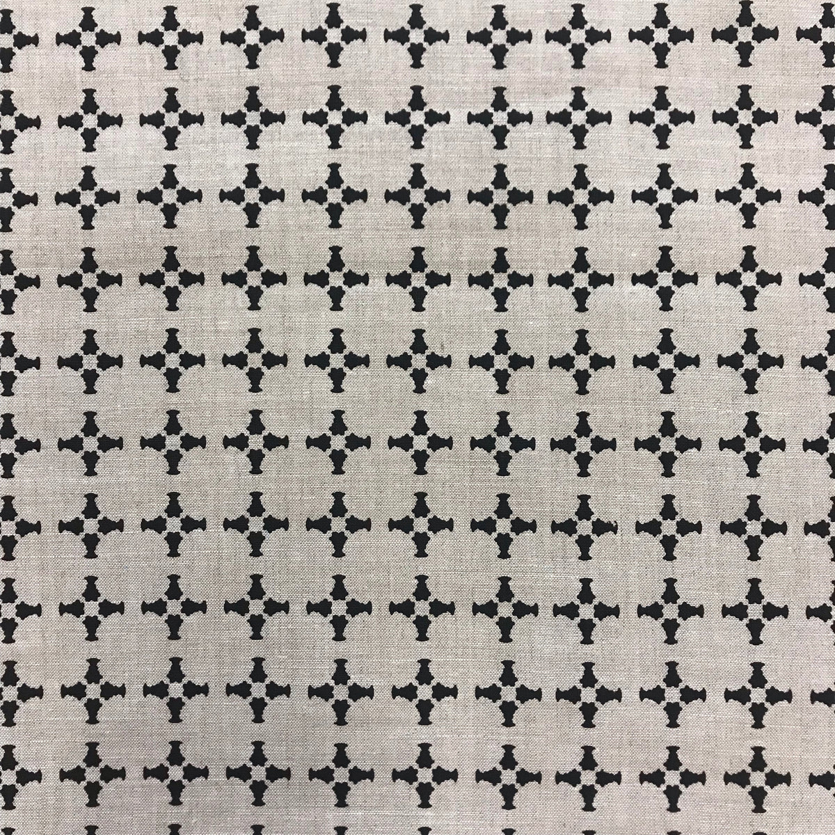 greige textiles cancan black on oatmeal hand made in california Hand-printed CanCan textile by Greige — featuring architectural cross forms for refined interiors, well-suited for drapery, soft furnishings, and upholstery projects.