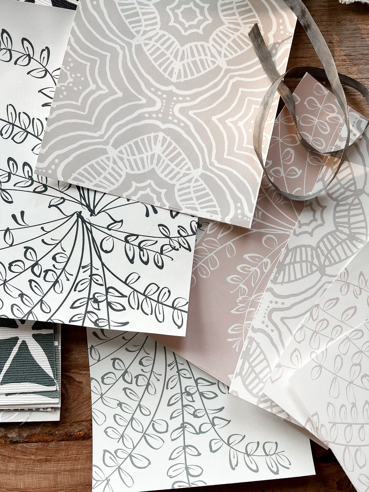 Elevate your home with Greige Textiles&#39; lively collection of hand screen-printed linen fabrics and artisan wallpapers.