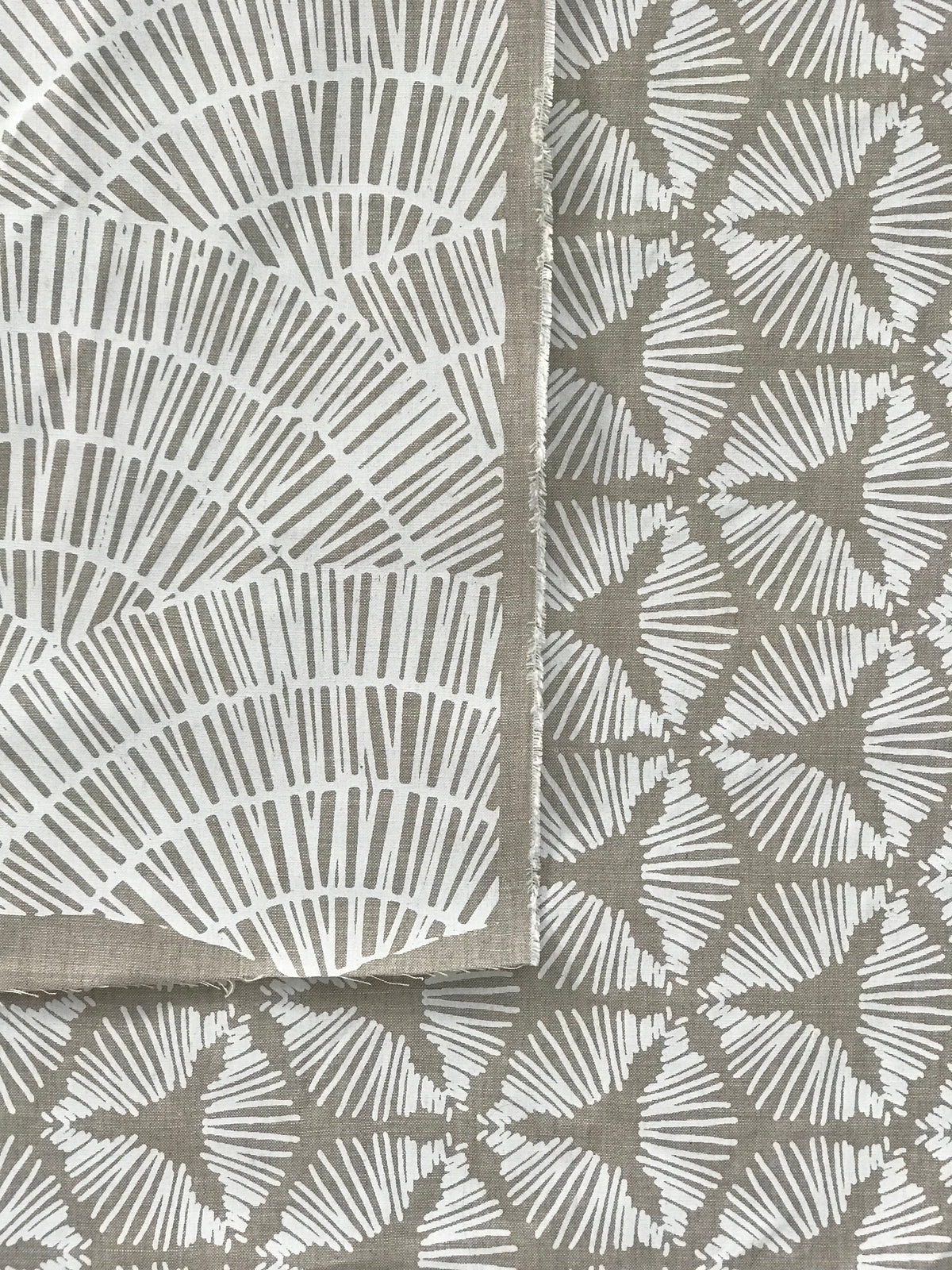 fan white on oatmeal greige textiles 