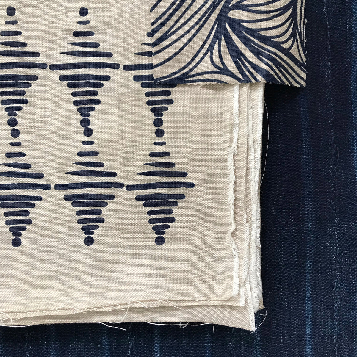 greige textiles micro batch textiles hand printed in California Stacked in indigo on oatmeal, mix with vintage african indigo textiles