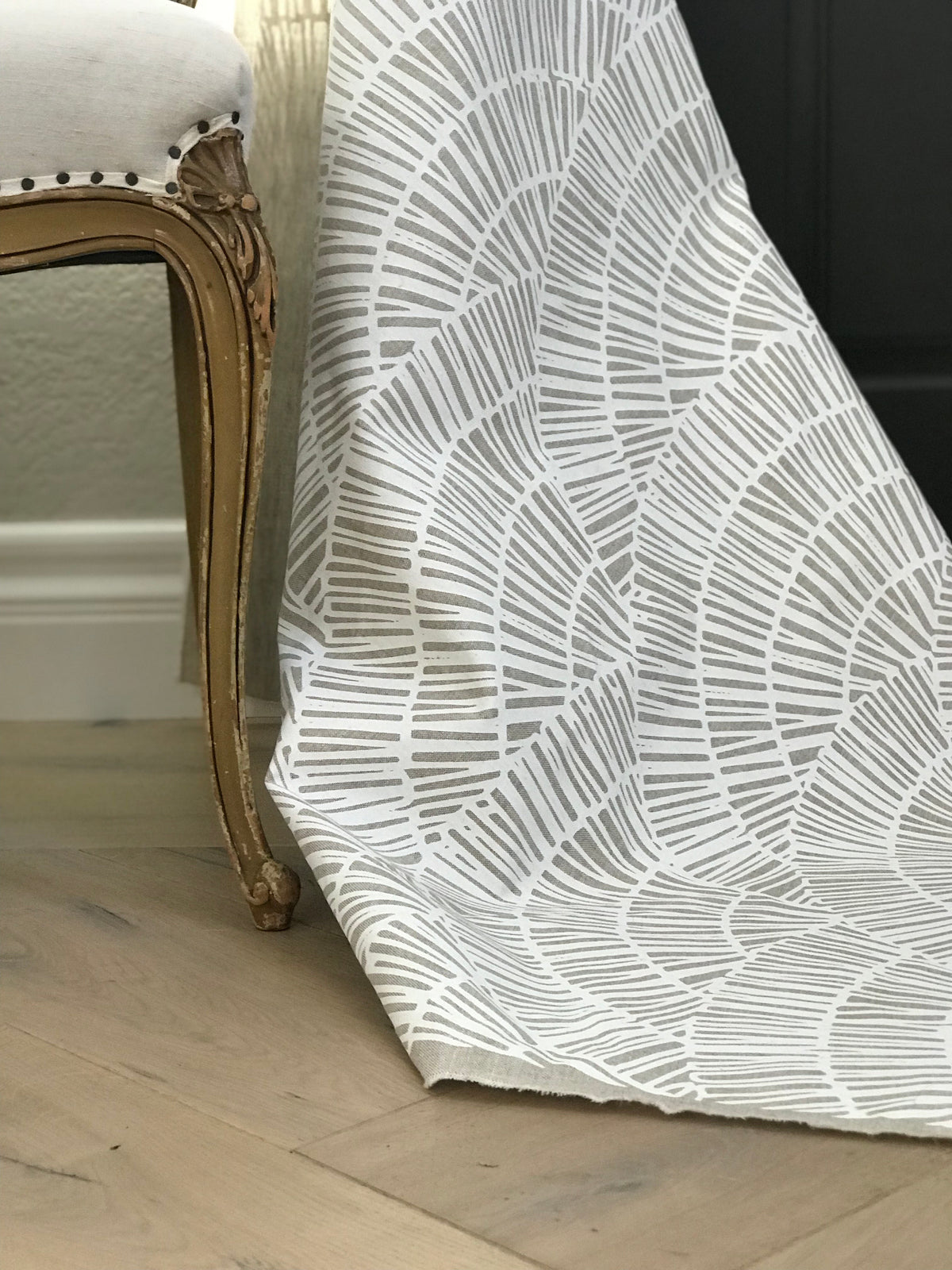 fan white on oatmeal greige textiles 