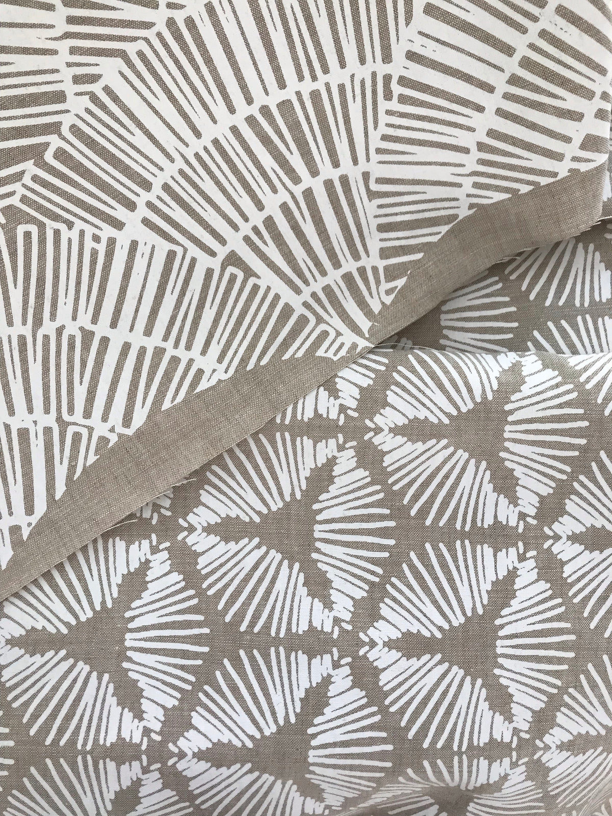 fan white on oatmeal greige textiles 